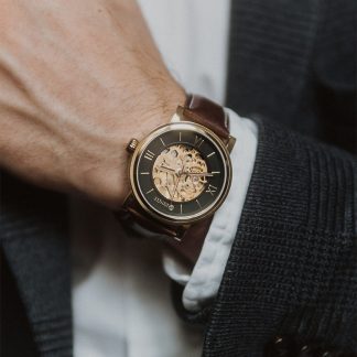 Ignite watch on man's wrist.